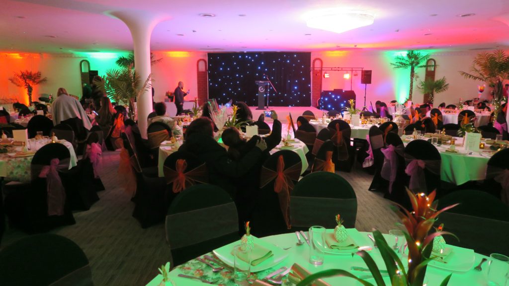 The Atrium, London, Black Starlit Backdrop On Stage For Corporate Awards Night, Orange & Green Uplighting